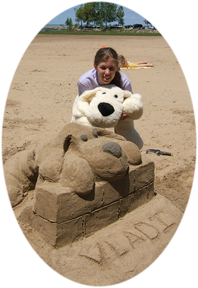 Sand castle of one of the Curleys' favorite stuffed dogs.