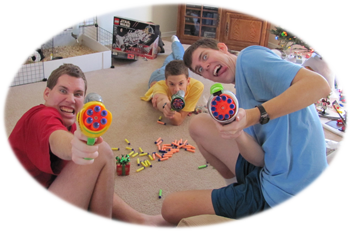 Aaron, Jacob, and Josiah having a Nerf war.