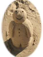 A boy carved out of sand.