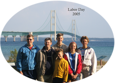 Curley family in front of the Mackinac Bridge.