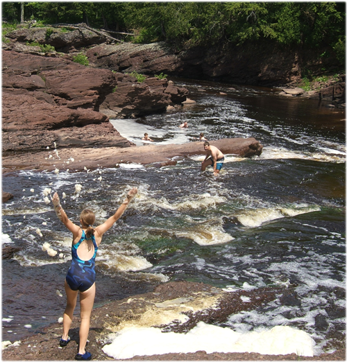 Curley kids playing in Sandstone Falls.